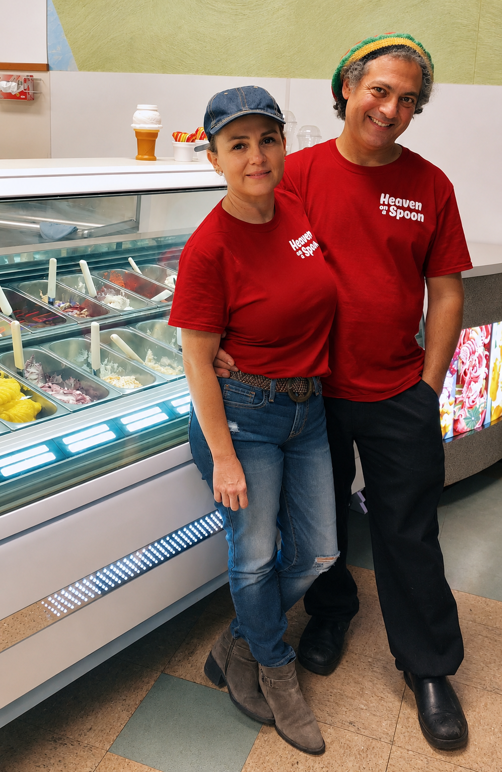 Gerard and Ericka Lombardo standing beside the gelato case at Heaven on a Spoon in Mesa, Arizona